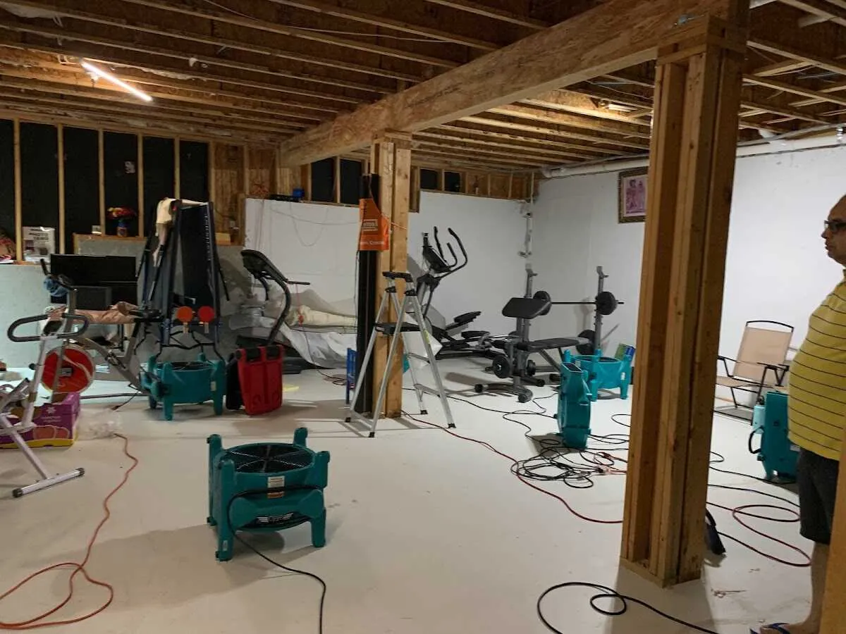 Basement drying equipment setup for Contents Cleaning & Restoration in Van Buren